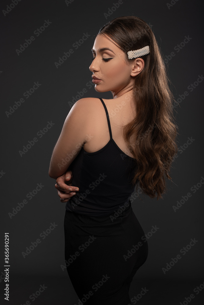 Beautiful girl posing on grey background. Isolated
Beauty session Beautiful girl posing on grey background. Isolated
Beauty session