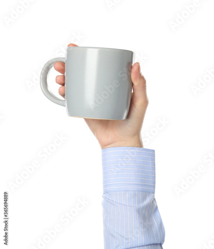 Woman holding grey cup on white background, closeup