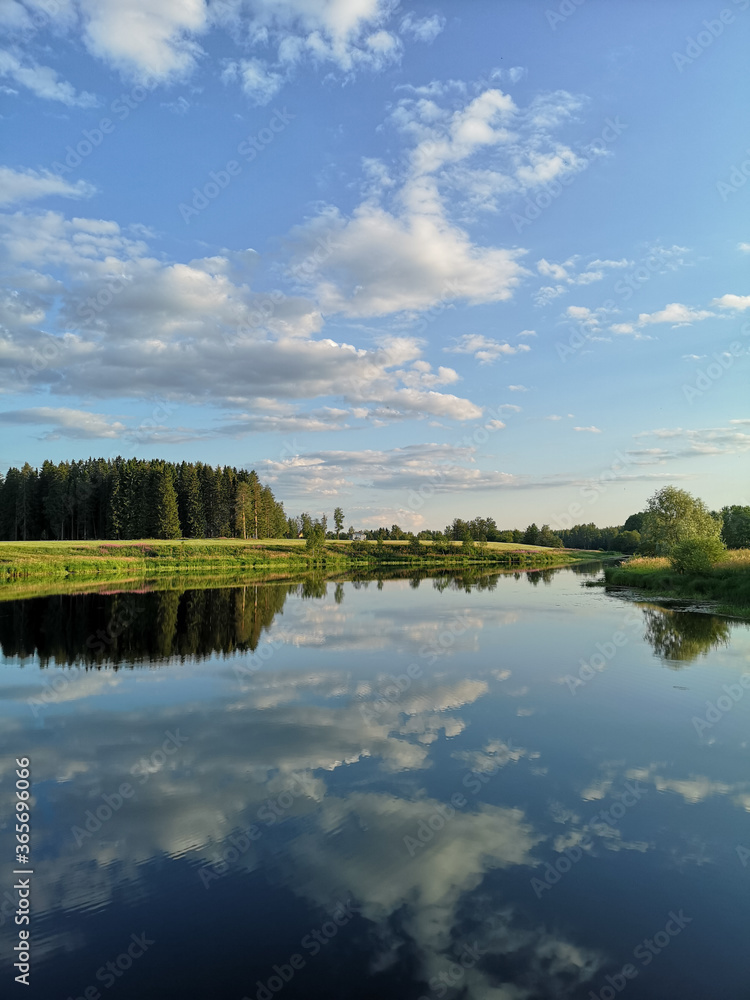 Summer clouds on the lake in Finland. 