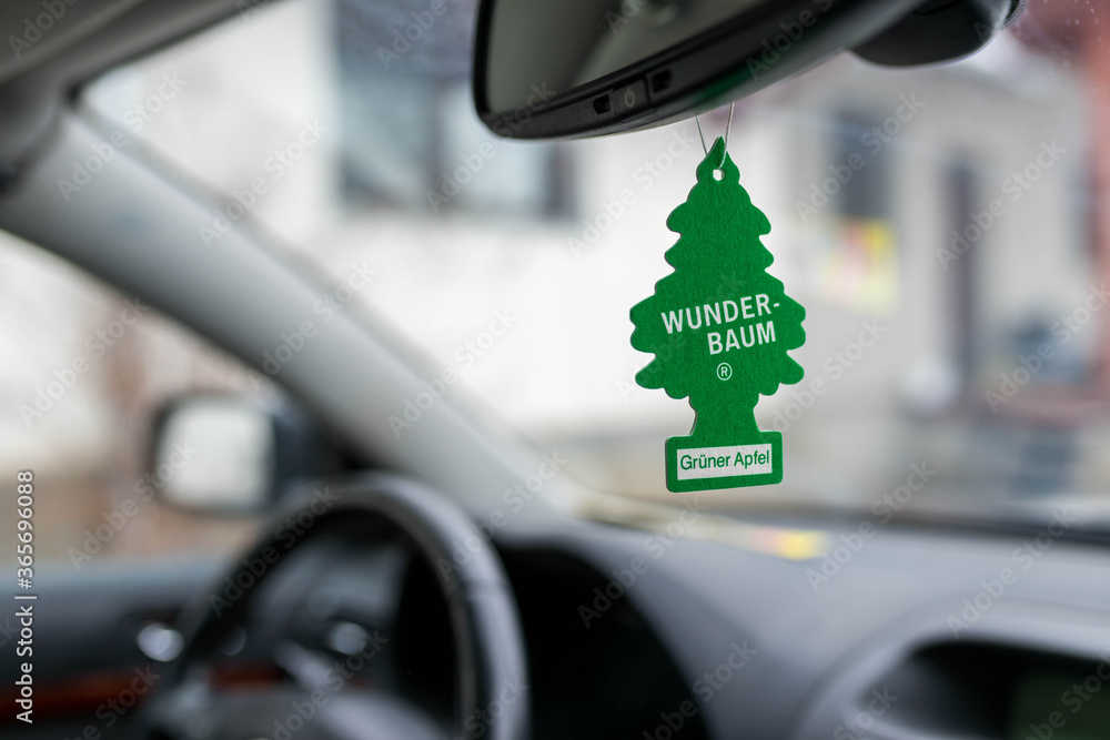 Miercurea Ciuc, Romania- 22 December 2018: Hanging Green Apple Wunder Baum  air freshener on car interior. Stock Photo