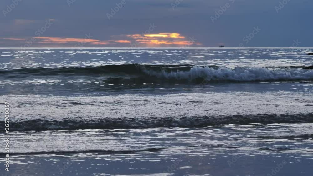 The ripples on the coast with the sunshine at dawn The ripples on the coast with the sunshine at dawn
