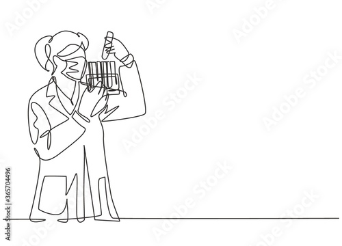 One continuous line drawing of young female laboratorian analyze formula on glass tube to find covid19 vaccine at laboratory. Coronavirus medical research concept single line draw design illustration