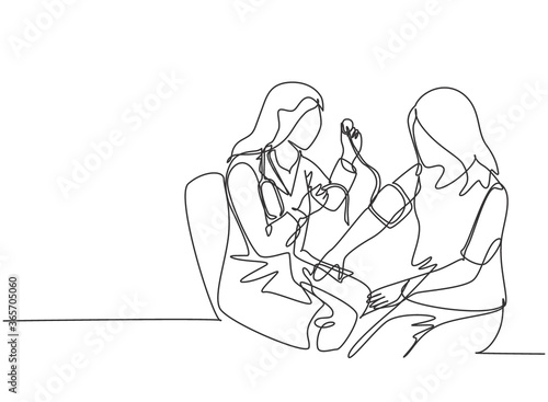 One continuous line drawing of young female doctor checking patient pulse rate and blood tension using tensiometer. Medical health care treatment concept single line draw design vector illustration
