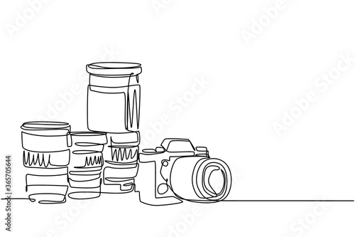 One single line drawing of old retro analog slr camera with set of telephoto and wide lenses. Vintage classic photography equipment concept continuous line draw design vector graphic illustration