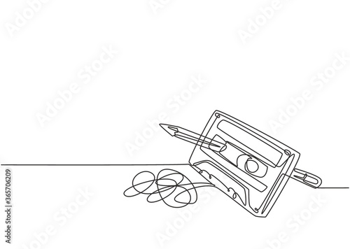 One single line drawing of tangled analog cassette tape ribbon rotate by wooden pencil. Vintage musical item concept continuous line draw design vector illustration graphic