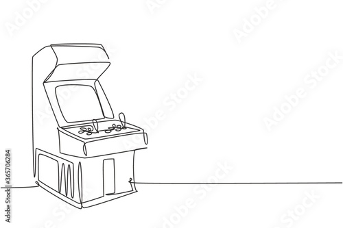 One single line drawing of old retro classic arcade video game machine at game center. Vintage coin based console game concept continuous line draw design graphic vector illustration