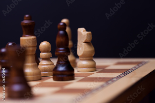 Chess, a lot of chess pieces on the Board. Intellectual game,