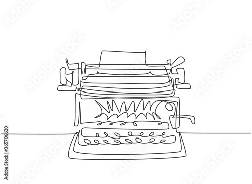 One continuous line drawing of retro old vintage typewriter front from view. Classic office item concept single line draw design vector graphic illustration