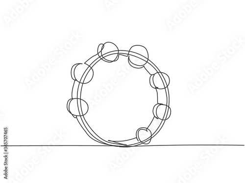 One continuous line drawing of round circle tambourine. Dynamic percussion music instruments concept single line draw graphic design vector illustration