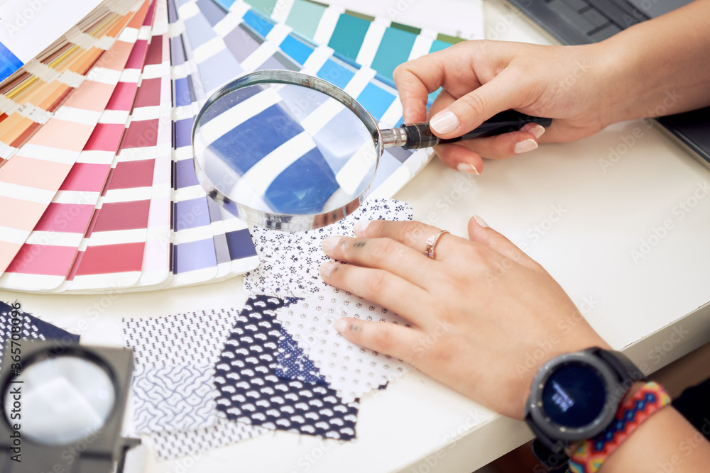 Female fashion designer holding color samples choosing fabric textile at workplace, dressmaker or tailor checking fabric quality, close up view
