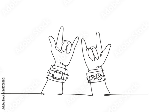 Single continuous line drawing of rocker showing hand gesture of rock music. Modern musician artist performance concept one line draw graphic design vector illustration
