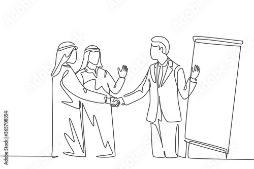 One continuous line drawing of young muslim business man handshake his partner after meeting presentation. Saudi Arabian with shemag, kandura and scarf. Single line draw design vector illustration
