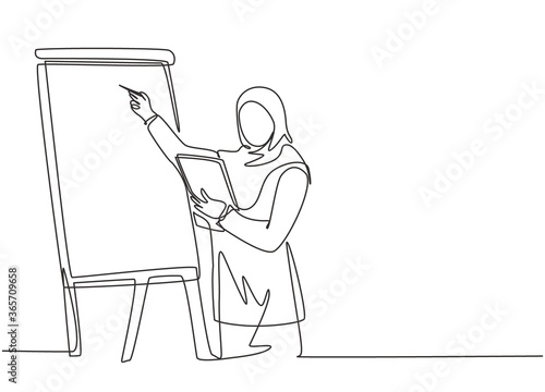 One continuous line drawing of young muslim businesswoman female do business presentation while team meeting at flip chart. Islamic clothing hijab and veil. Single line draw design vector illustration