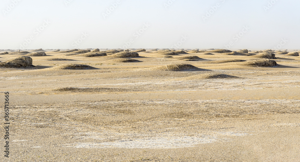 Panoramic view of a rocky desert landscape in africa, the Erg du Djourab, Chad Panoramic view of a rocky desert landscape in africa, the Erg du Djourab, Chad