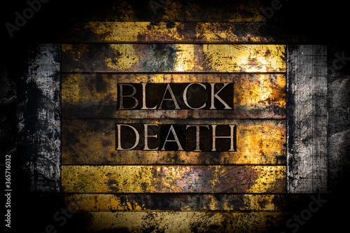 Black Death text formed with real authentic typeset letters on vintage textured monochrome grunge background