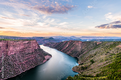 Purple aerial above view from Canyon Rim trail overlook near campground in Flaming Gorge Utah National Park with Green River at sunset twilight evening photo