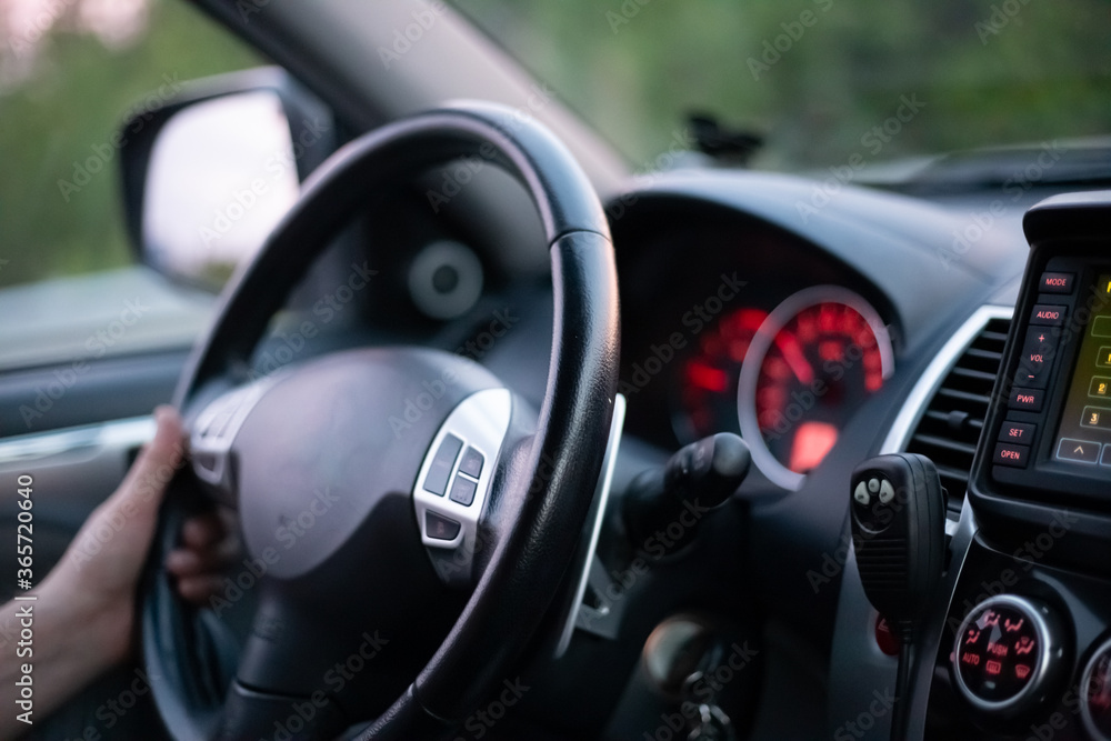 car interior with control panel with luminous devices, steering whee car interior with control panel with luminous devices, steering whee
