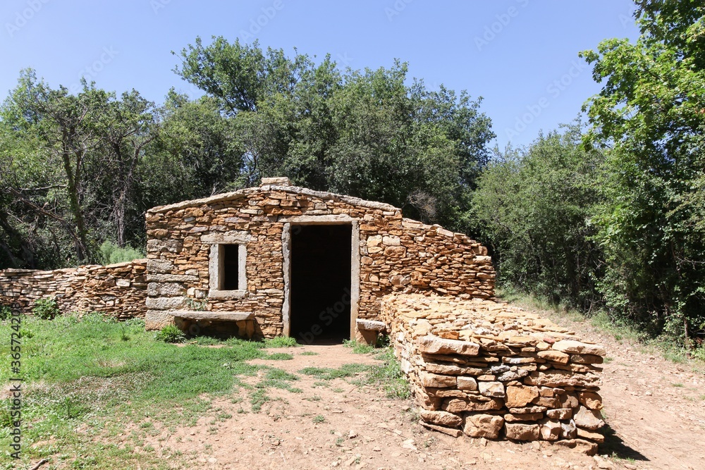 Old and typical stone hut called caborne in French language in Saint Cyr au Mont d'or, France Old and typical stone hut called caborne in French language in Saint Cyr au Mont d'or, France