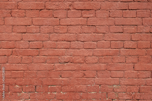 abstract background of an old red brick wall close up