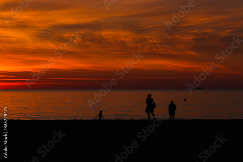 sunset on the beach © Vitaly