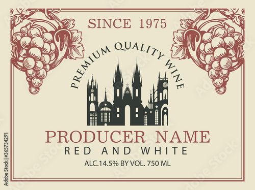 Wine label for red and white wine with silhouette of old european town and hand-drawn bunches of grapes. Vector label in retro style on the old paper background.