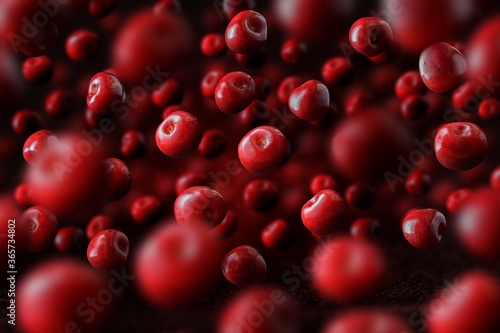 Flying or levitated cherries on a dark background with steam or water particles