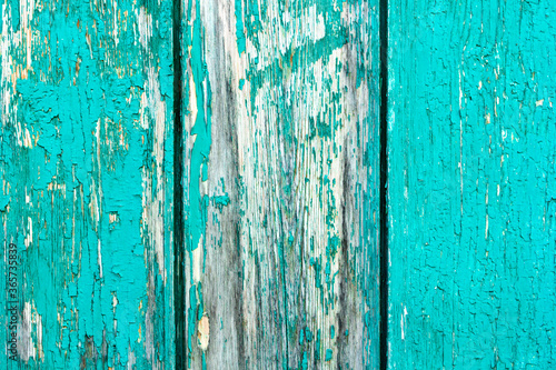 фотографія Old rustic painted cracky green, turquoise wooden texture or background