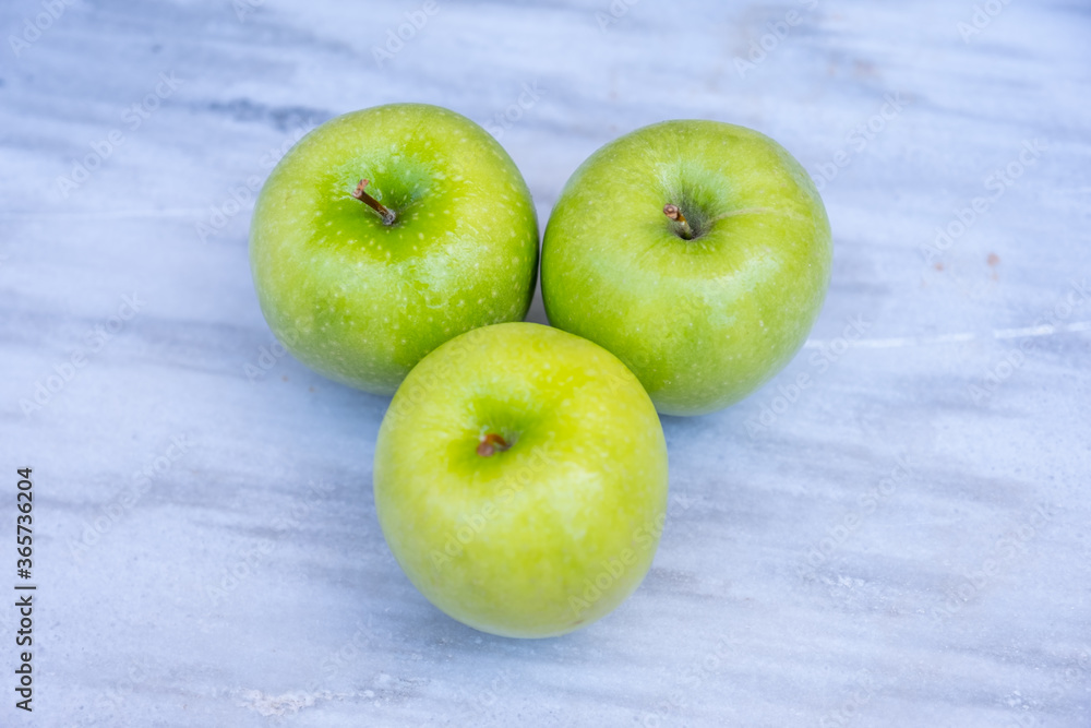 Three apples sitting next to each other Three apples sitting next to each other
