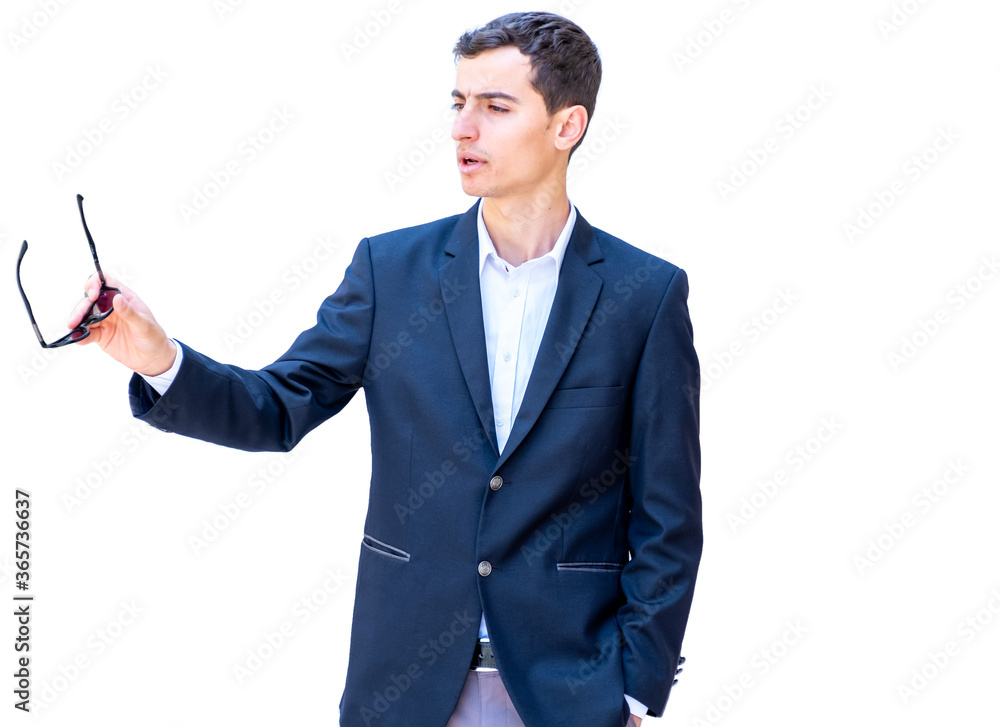 Arabic businessman holding sunglasses in his hand Arabic businessman holding sunglasses in his hand