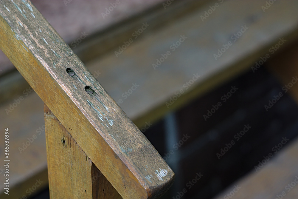 railing of an old wooden porch railing of an old wooden porch