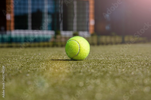 Tennis Ball on the Court Close up © Aliaksandr