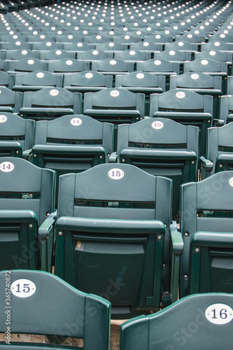 green plastic seats in stadium