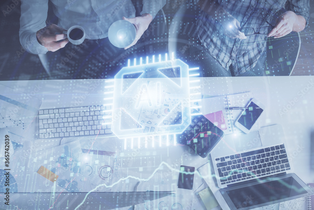 Double exposure of man and woman working together and data theme hologram drawing. Computer background. Top View. Double exposure of man and woman working together and data theme hologram drawing. Computer background. Top View.