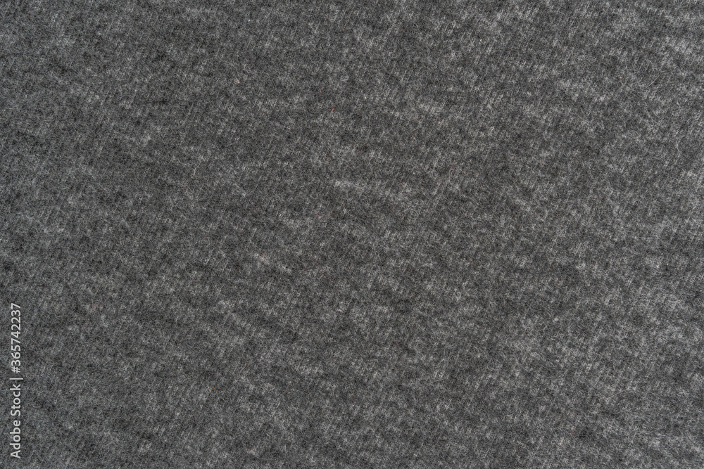 Fototapeta premium Gray woolen plaid material close-up