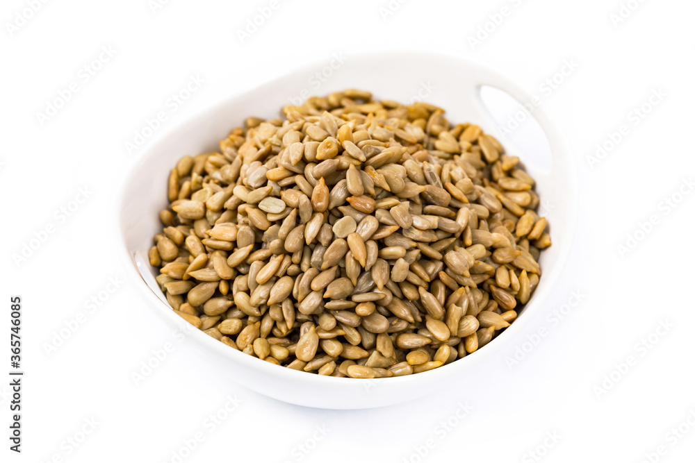 Sunflower Kernels Roasted Seeds Isolated on White Background. Selective focus. Sunflower Kernels Roasted Seeds Isolated on White Background. Selective focus.