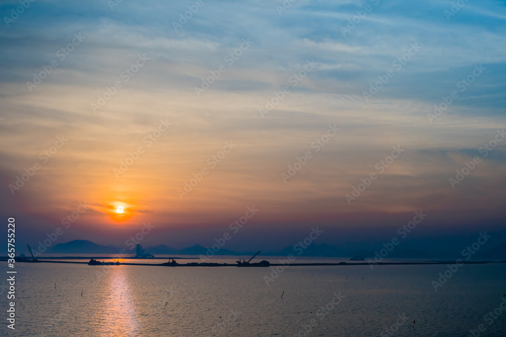 Construction barges at sunset. Construction barges at sunset.