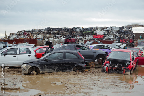 Melbourne, Victoria / Australia - July 18 2020: Old wrecked cars in junkyard. Car recycling.