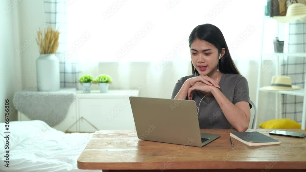 Asian woman talked with colleagues about video conferencing plans, Work from home. Asian woman talked with colleagues about video conferencing plans, Work from home.