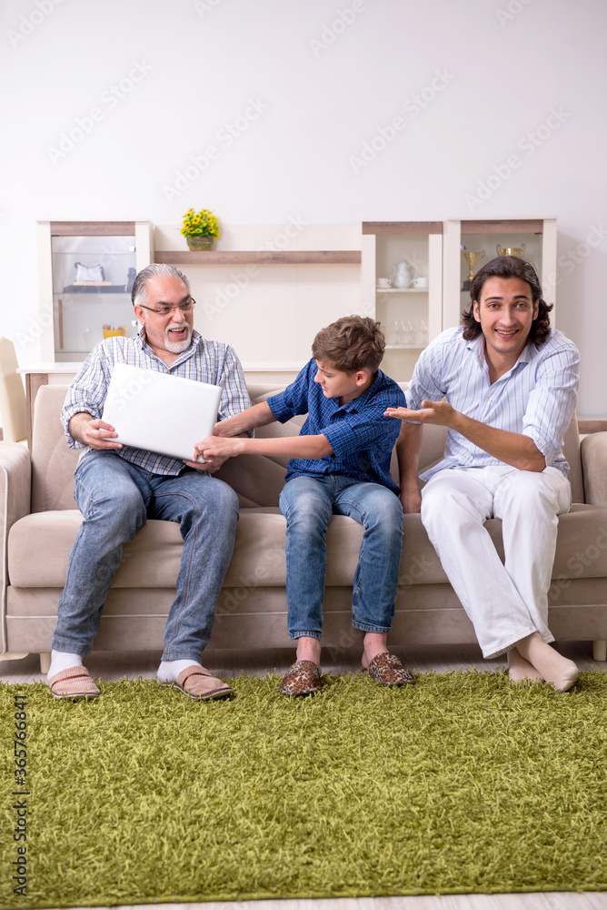 Boy and his father and his grandfother indoor Boy and his father and his grandfother indoor