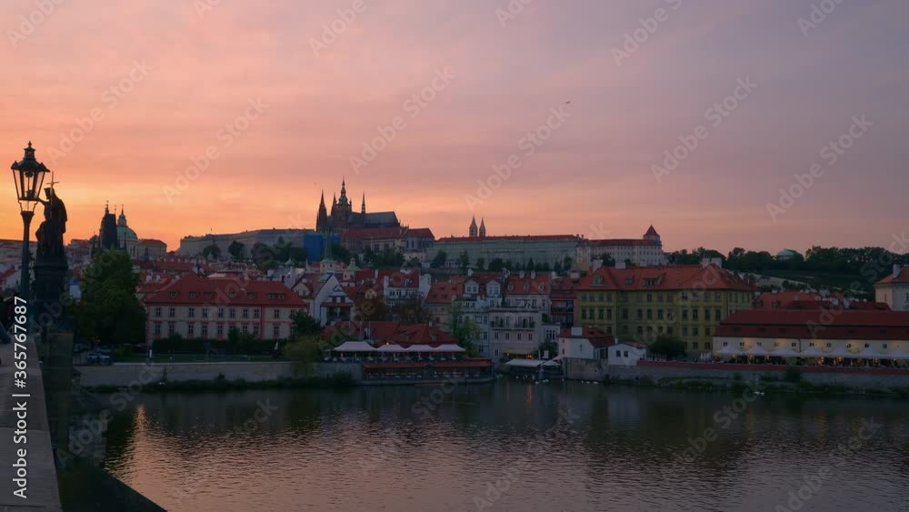 Prague town, Vltava river and Vitus Cathedral at late evening in Prague, Czech Republic Prague town, Vltava river and Vitus Cathedral at late evening in Prague, Czech Republic