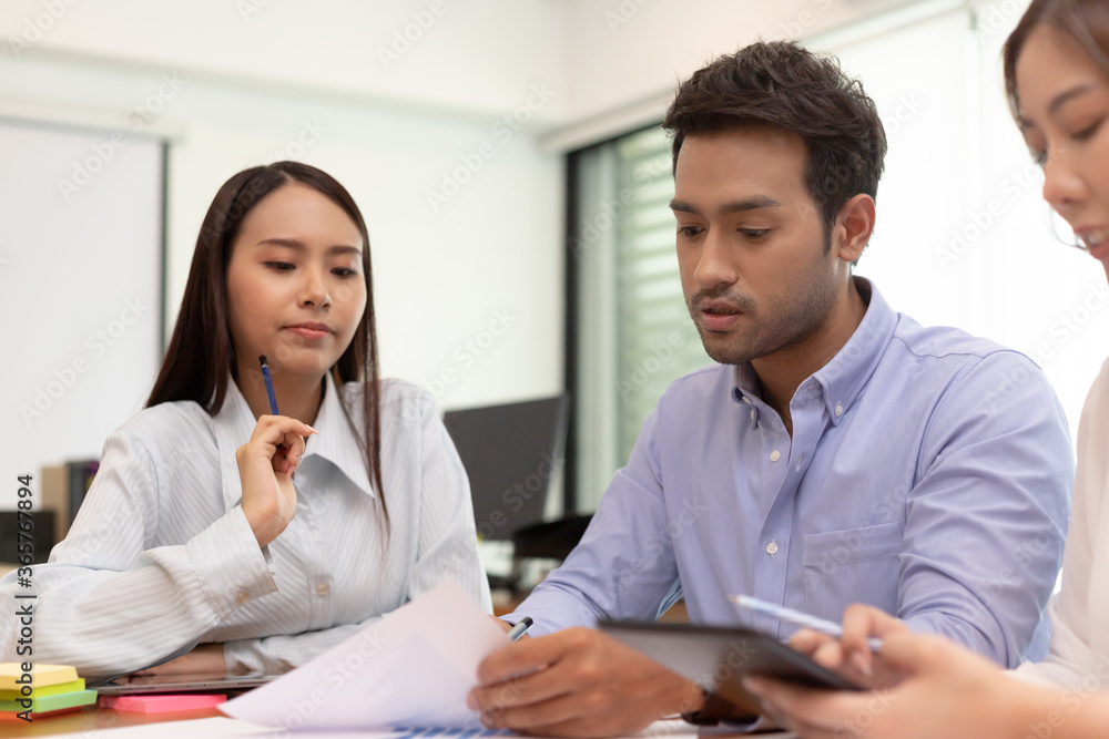 Asian business man and women meeting and talk about job in office. Asian business man and women meeting and talk about job in office.