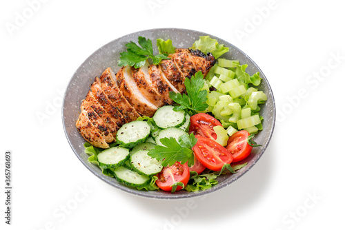 Grilled chicken breast, fillet and fresh vegetable salad. Healthy lunch menu. isolated on white background 