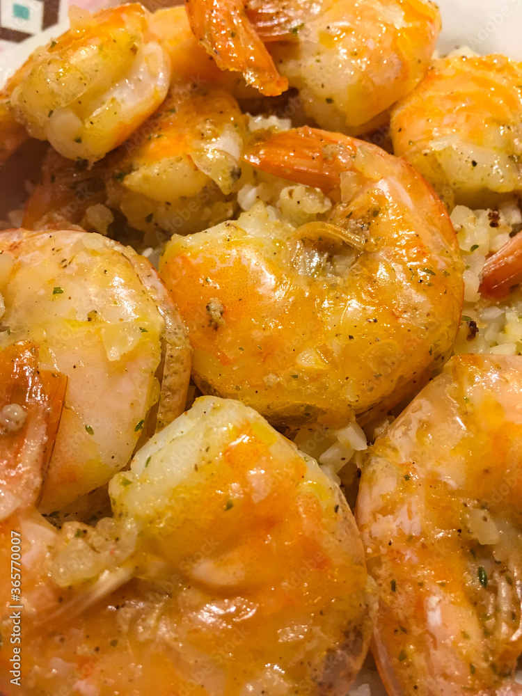A closeup of a shrimp dish over riced cauliflower A closeup of a shrimp dish over riced cauliflower