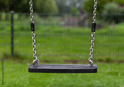 empty swing on a playground