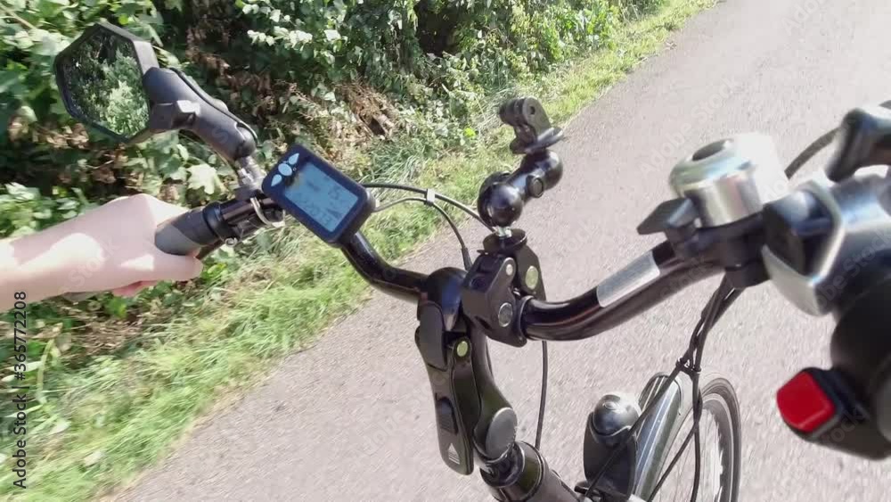 Riding on electric bike, Ebike or bicycle. Power control and switch on