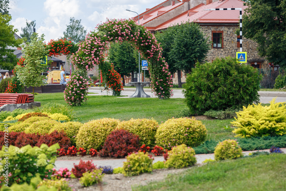 City Plavinas, Latvia. City green garden with flowers.
