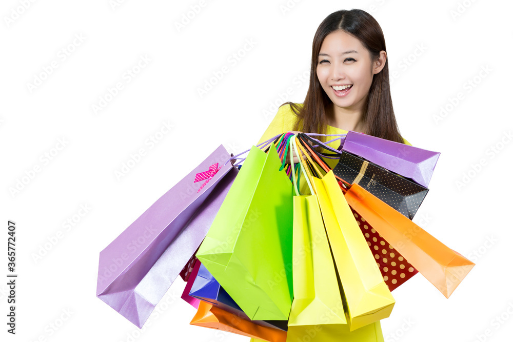Young Woman holding paper bags after shopping