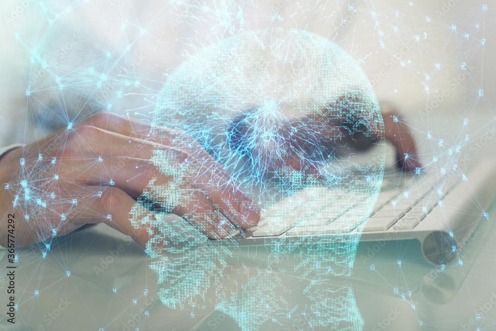 Fototapeta premium Man with computer background with brain theme hologram. Concept of brainstorm. Double exposure.