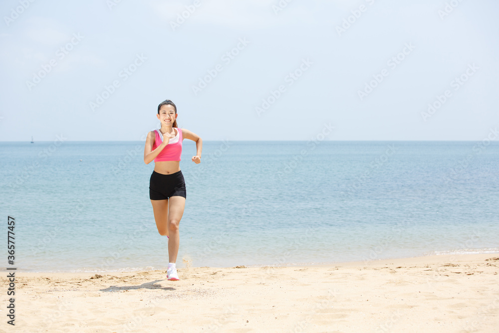 Young Asian woman doing exercise outdoors Young Asian woman doing exercise outdoors