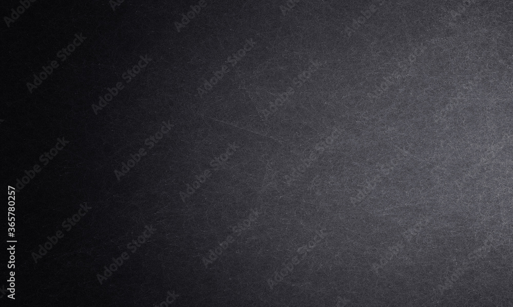 Black and gray textured grunge background. Industrial concrete wall as background for designs
Black and gray textured grunge background. Industrial concrete wall as background for designs